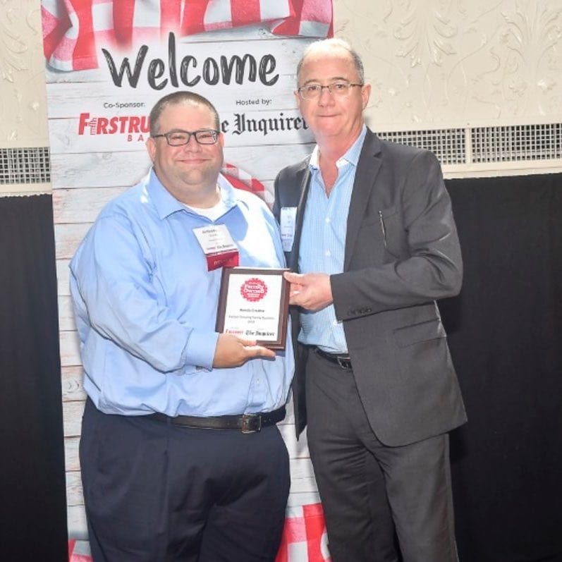 Anthony J. Biondo Jr. Receiving the award for fastest growing family business in Philadelphia from Terrence C.Z. Egger of the Philadelphia Inquirer.